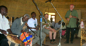 Paul Winter with Dokku Lenda, Andreas Kalima, and Andy Cooke, collaborating on new music in Ethiopia.